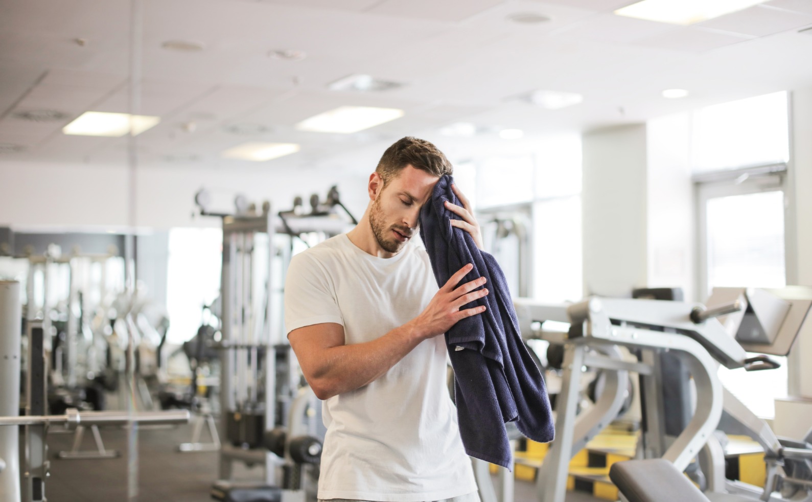 FINALfit man taking a break from working out at the gym picture id1062847534