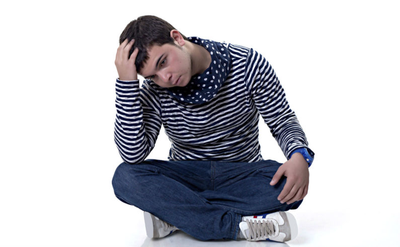 Man sitting on floor 000062573636 Large